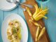 Gegrillter Red Snapper mit Melone angerichtet auf Porzellan von Tafelstern