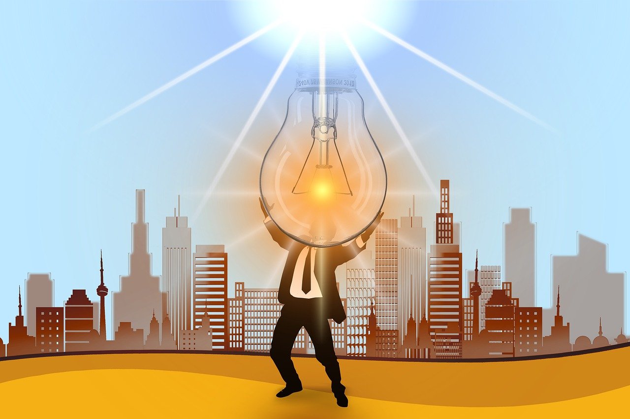 Mann mit Glühlampe
