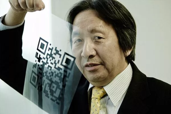 Masahiro Hara präsentiert einen QR-Code