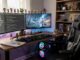 Computerpielplatz mit Spielen, Bildschirmen und Figuren