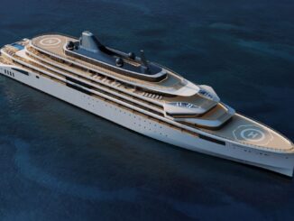 Aerial view of a large white luxury yacht cruising on dark blue ocean, with multiple sun decks and a visible helipad on the bow and stern areas.